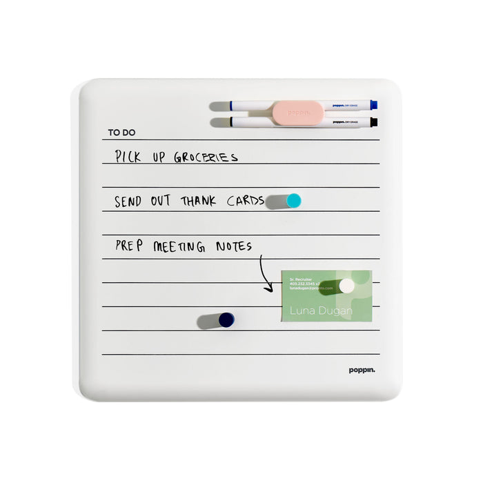 White magnetic dry-erase board with to-do list, markers, and magnets. 