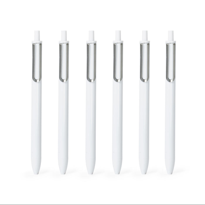 Set of six white sleek design pens isolated on a white background. 