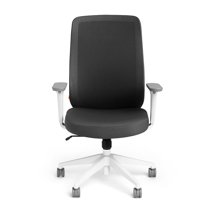 Modern ergonomic office chair with black upholstery and white base on a white background. 