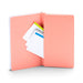Open pink folder with multicolored tabs and white sheets on white background. 