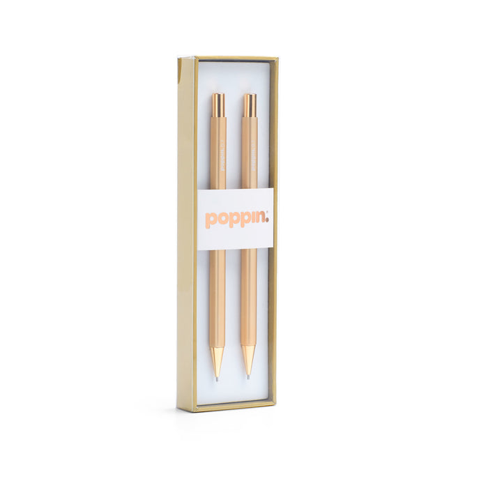 Rose gold pens in a branded Poppin box on a white background. 