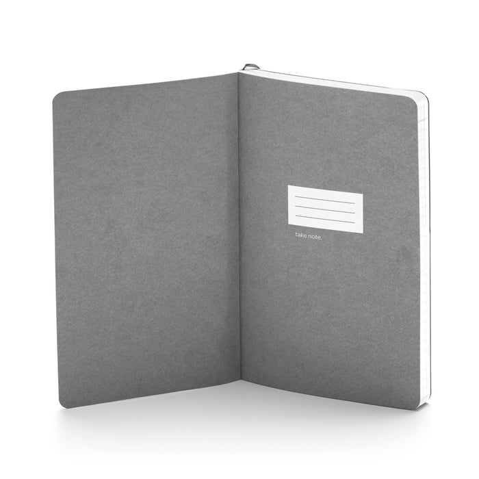 Blank open notebook with "take note" label on right page against white background. 