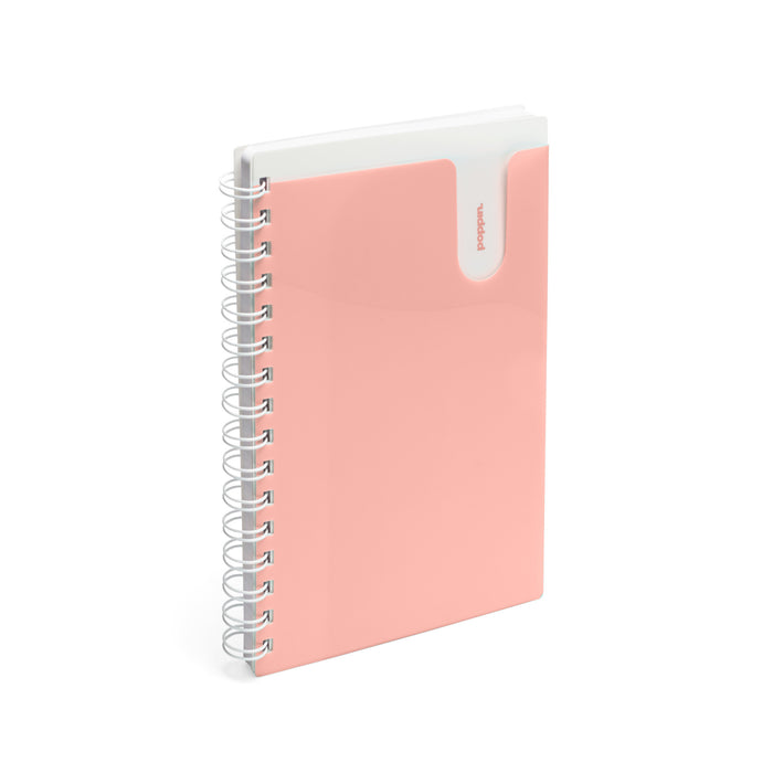 Pink spiral notebook with clear pocket on white background. (Blush)