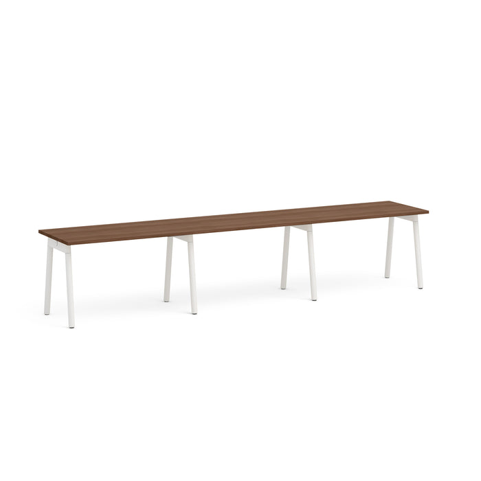 Long wooden table with white legs on a white background. (Walnut-47&quot;)