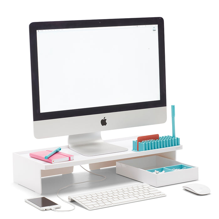 Apple iMac on desk with keyboard, mouse, stationery, and smartphone. (White)