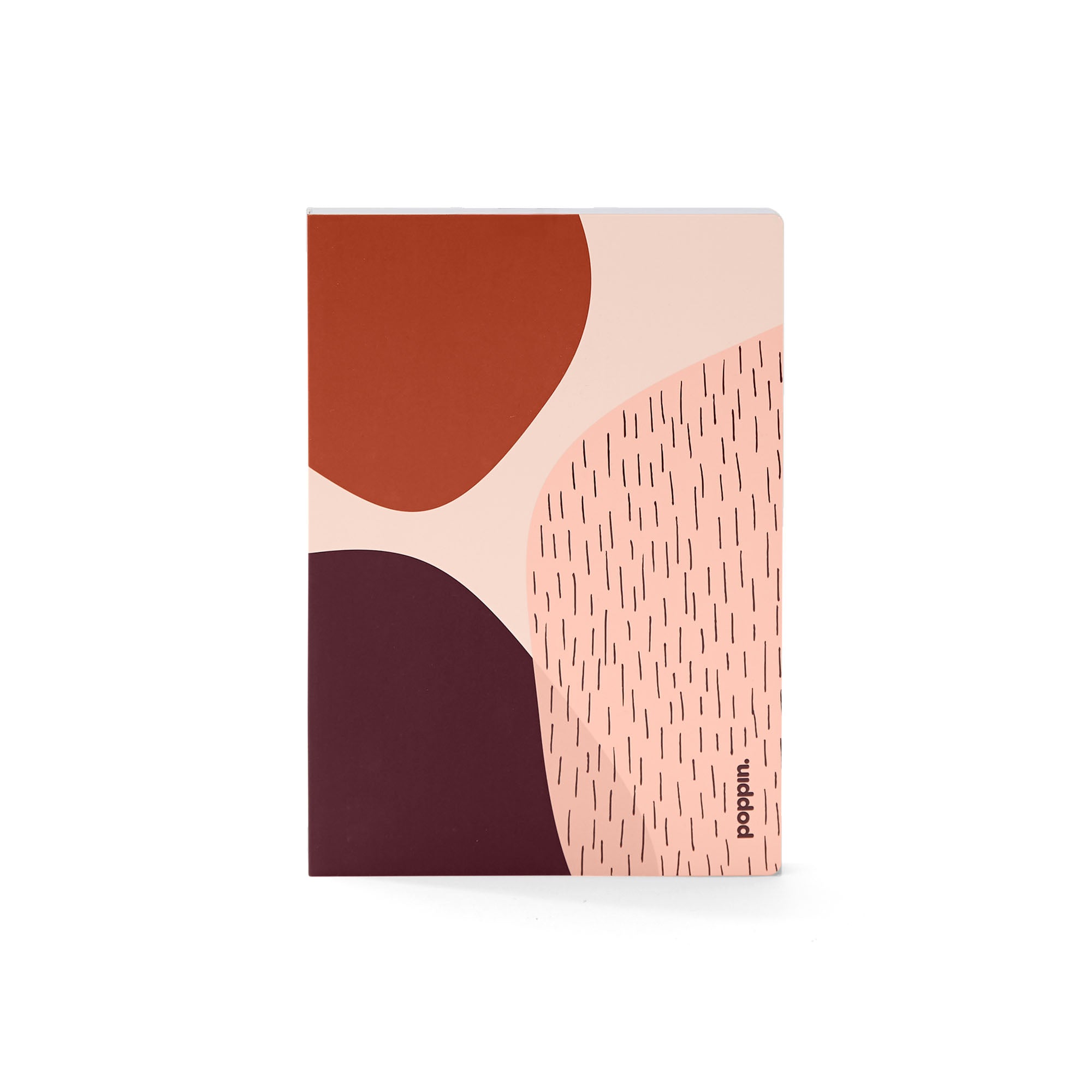 Abstract design notebook with pastel colors and geometric patterns standing against white background. (Blush)