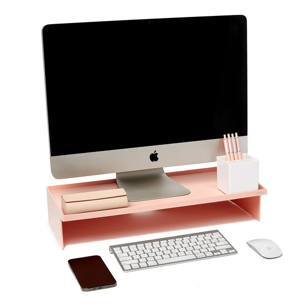 Apple iMac on pink desk organizer with keyboard, mouse, smartphone, and station (Blush)