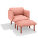 Modern coral pink armchair with matching ottoman on white background. (Blush)