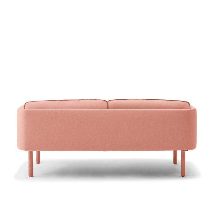 Modern pink fabric sofa with wooden legs isolated on white background (Blush)