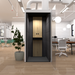 Modern office interior with a sleek wooden phone booth, white brick walls, and contemporary (White)
