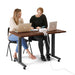 Two colleagues working together at a desk with laptops on a white background. (Walnut-47&quot;)