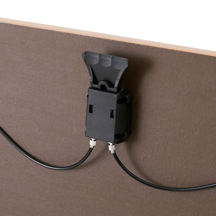 Black cable holder with cords mounted on brown board against a beige wall. (Natural Oak-47&quot;)(Walnut-47&quot;)(White-47&quot;)(Natural Oak-57&quot;)(Walnut-57&quot;)(White-57&quot;)