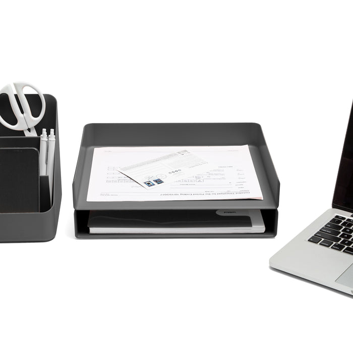 Organized desk with in-tray, supplies, documents, and laptop on white background. (Dark Gray)