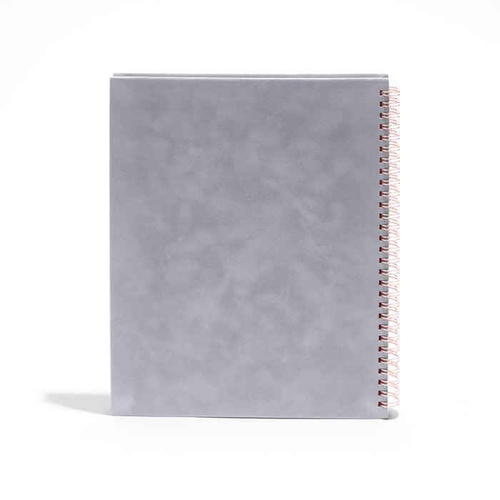 Gray spiral notebook with a hard cover on a white background. (Dove Gray)