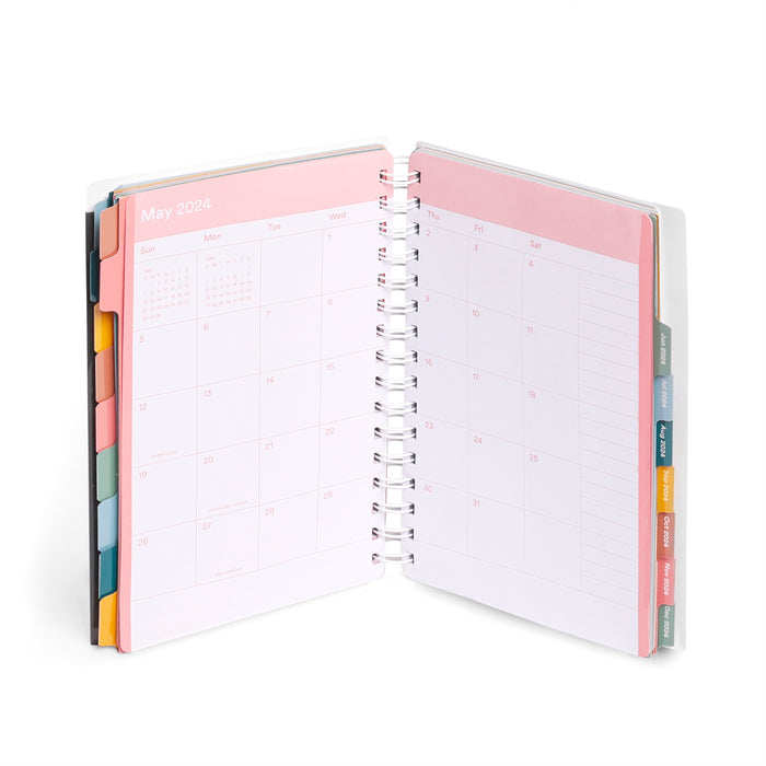 Open planner showing May 2024 calendar on a white background. (Blush)(Slate Blue)(Dark Gray)