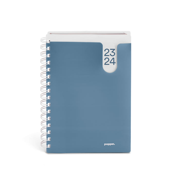 Blue Poppin spiral notebook standing against white background (Slate Blue)