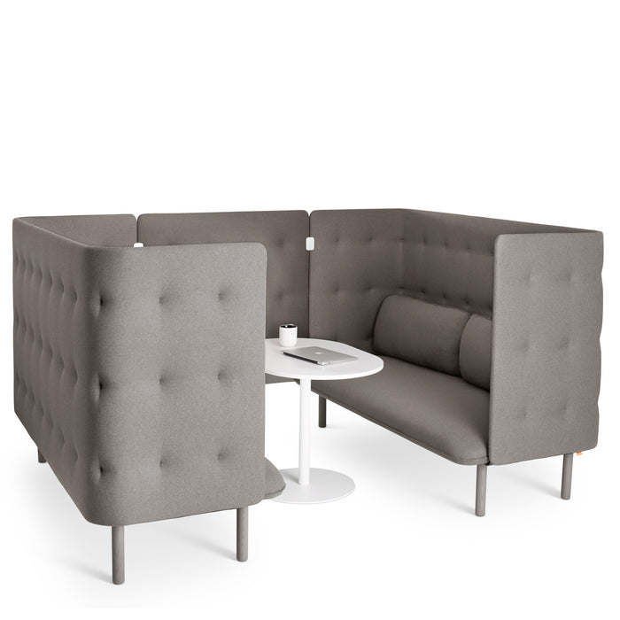 L-shaped gray upholstered booth seating with white round table on a white background. (Gray-Gray)