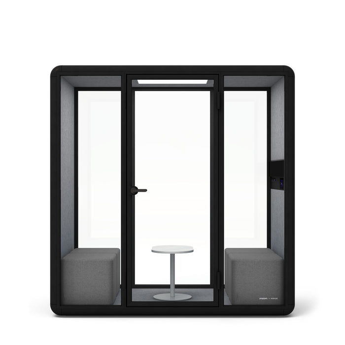 Modern black office pod with glass door and side panels, two gray seats and a white table inside. (Gray)