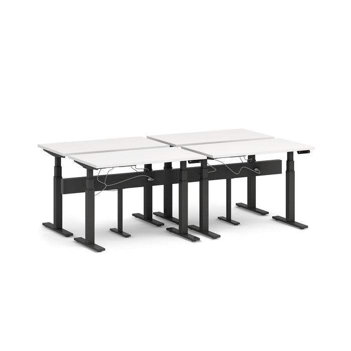 Modern height-adjustable dual desk setup with black frames and white tabletops on a white background. (Charcoal-100&quot;)