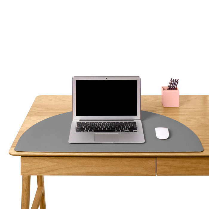 Laptop on wooden desk with mouse and pink pen holder against a white background. (Dark Gray)