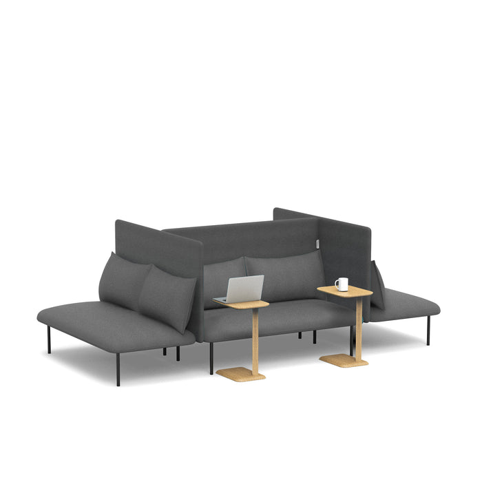 Modern gray sectional sofa with laptop and coffee cup on small side tables against a white background. (Dark Gray-Dark Gray)