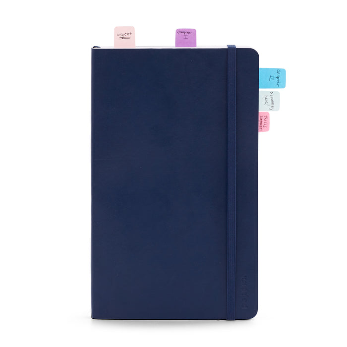 Navy blue journal with colorful sticky tabs and elastic closure on white background. (Assorted)