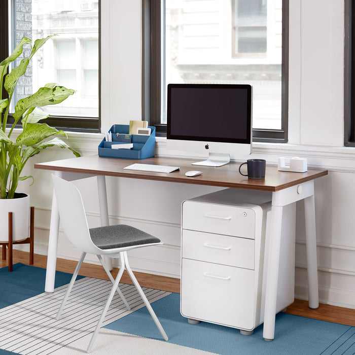 Modern home office setup with iMac on wooden desk, white chair, and filing (White-White)