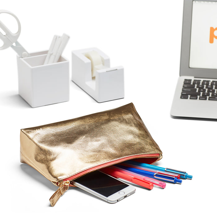 Gold pencil case with pens, smartphone, and laptop on white background. (Gold)