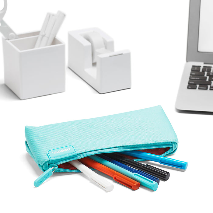 Teal pencil case with pens and laptop on a white desk, office supplies organization (Aqua)