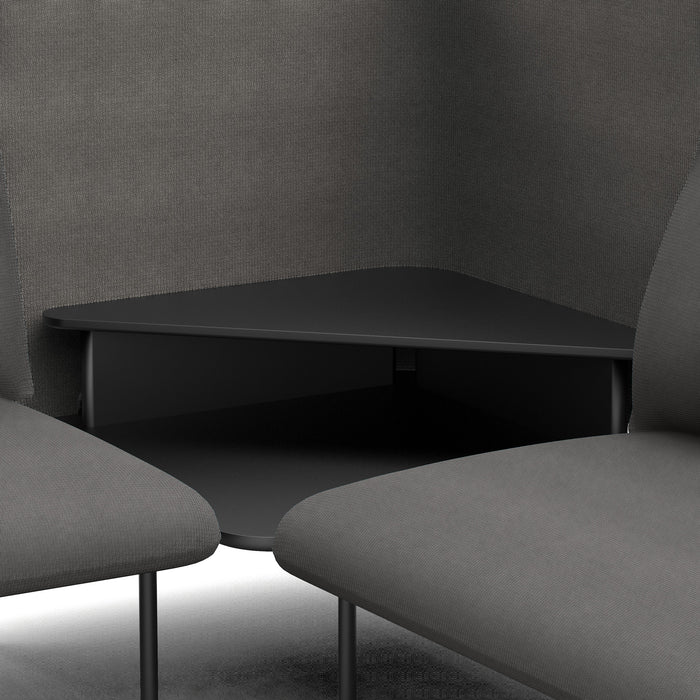 Modern black coffee table between two grey armchairs with textured wall background. (Dark Gray-Dark Gray)