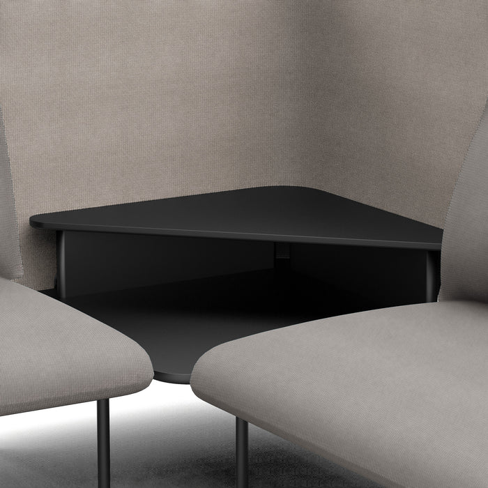 Modern black coffee table between two beige upholstered chairs with grey background. (Gray-Gray)
