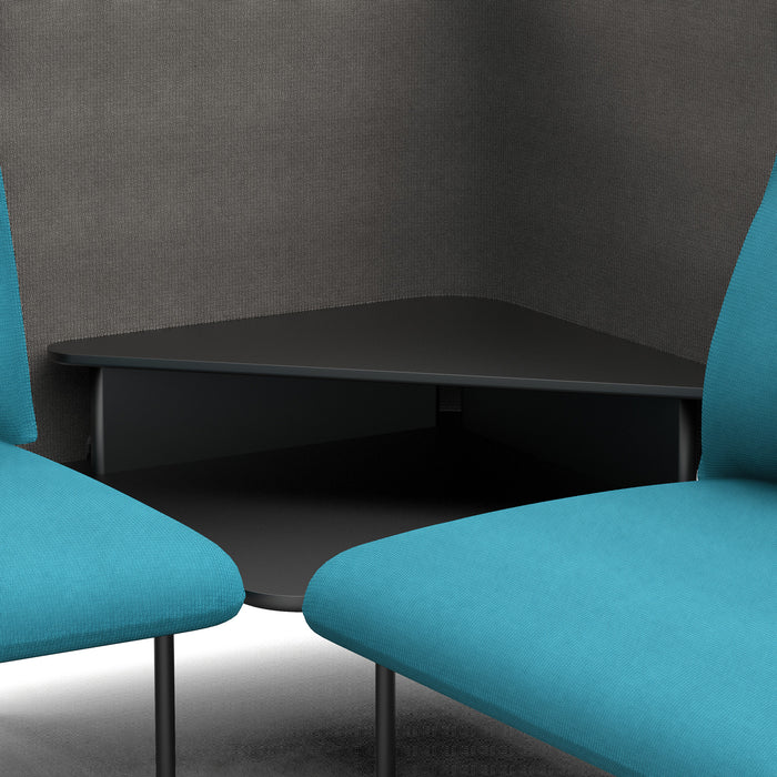Modern office corner with blue chairs and black table against a textured gray wall. (Teal-Dark Gray)