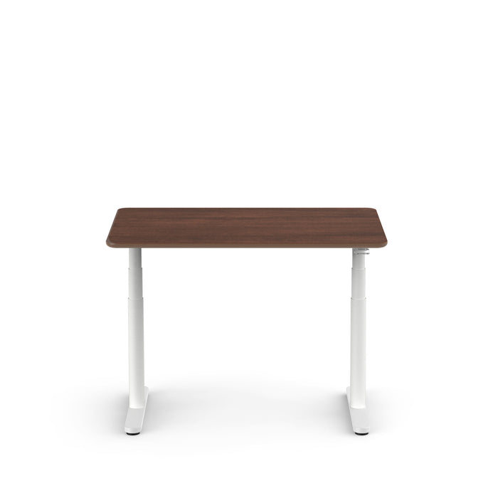 Modern height-adjustable desk with dark wood top and white legs on white background. (Walnut-48&quot;)