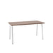 Modern wooden table with white legs on a white background. (Walnut-57")