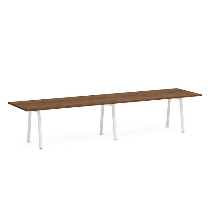 Modern long wooden table with white legs isolated on white background. (Walnut-144&quot; x 36&quot;)