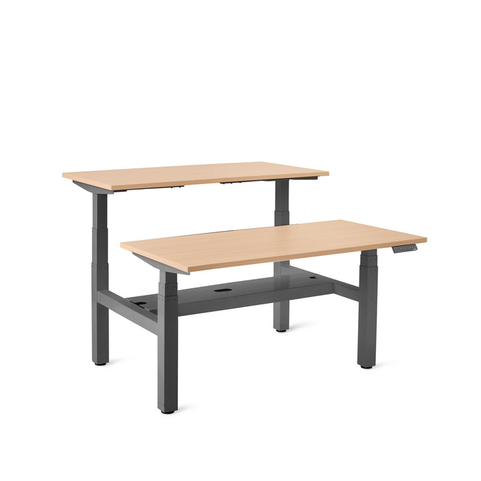 Height-adjustable wooden desk with dual ergonomic tiers on a white background. (Natural Oak-47&quot;)