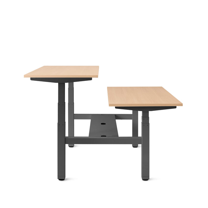 Adjustable height standing desks with wooden tops on a white background. (Natural Oak-57&quot;)