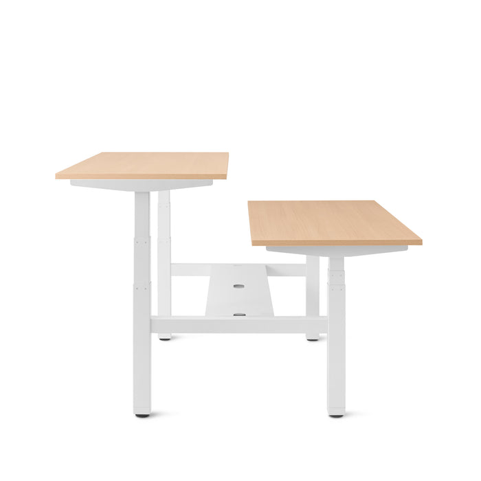 Adjustable wooden top desks with white standing frame on a white background. (Natural Oak-57&quot;)