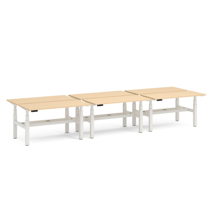 Three modular office desks arranged in a line on a white background. (Natural Oak-47&quot;)