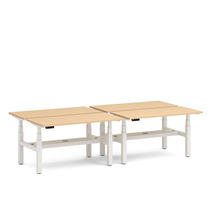Two adjustable beige office desks with white frames on a white background. (Natural Oak-57&quot;)