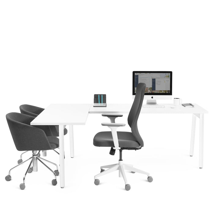 Modern office setup with white desks, ergonomic chairs, and desktop computer. (White)