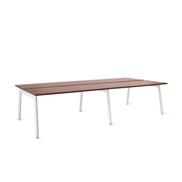 Modern brown wooden table with white legs on a white background. (Walnut-57&quot;)