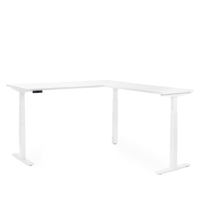White L-shaped adjustable standing desk isolated on white background. (White)