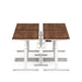 Dual sit-stand desks with wooden tops and white frames on a white background. (Walnut-47&quot;)