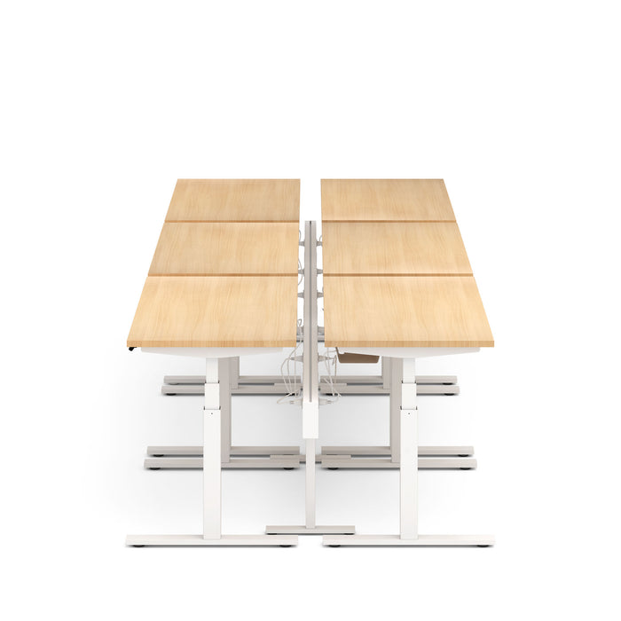 Dual motor standing desks with wooden top and white frame on a white background. (Natural Oak-57&quot;)