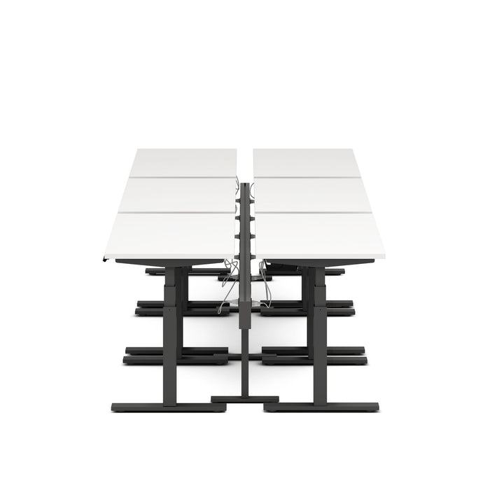 Modern height-adjustable standing desk in white and black colors isolated on white background. (White-47&quot;)