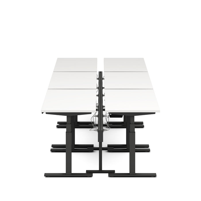 Dual sit-stand adjustable workstations with white tabletops isolated on white background. (White-57&quot;)