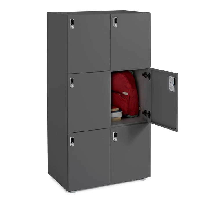 Metal storage lockers with one door open revealing a red backpack and books inside. (Charcoal)