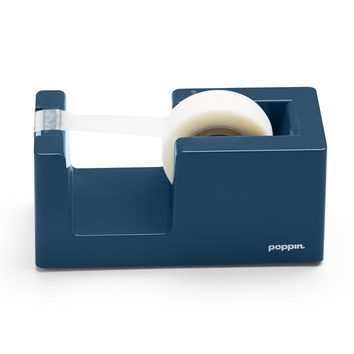 Blue Poppin brand desktop tape dispenser with white tape on isolated background. (Slate Blue)