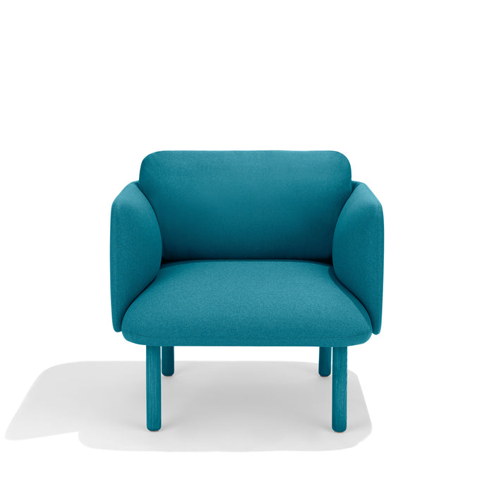 Bright blue modern sofa on a white background. (Teal)